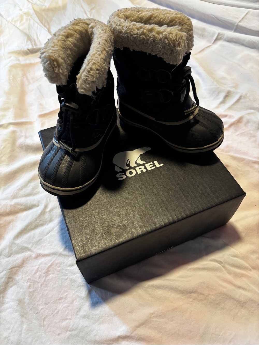 Sorel Kids Black Winter Boots with Cream Faux Fur Cuff